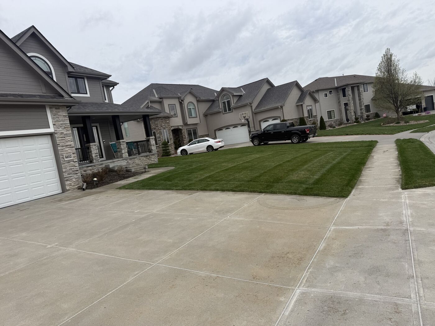 Striped lawn mowing in Papillion, NE by Picasso Lawn Care