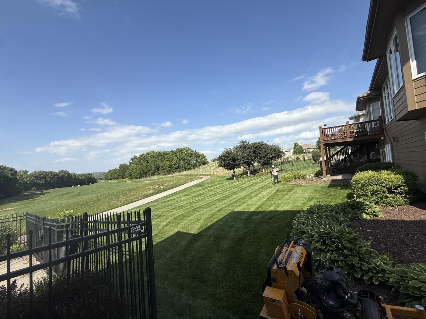 Golf course backyard lawn care in Papillion, NE by Picasso Lawn Care